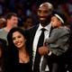 Kobe Bryant poses with his family after both his #8 and #24 Los Angeles Lakers jerseys are retired at Staples Center on December 18, 2017 in Los Angeles.